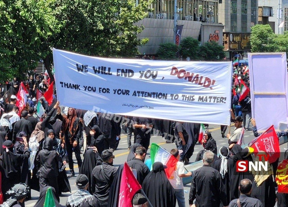 thefreeledger's tweet photo. Banner at Khamenei's funeral procession:

We will end you, Donald! 

Thank you for your attention to this matter! https://t.co/kRpK7kFuwo