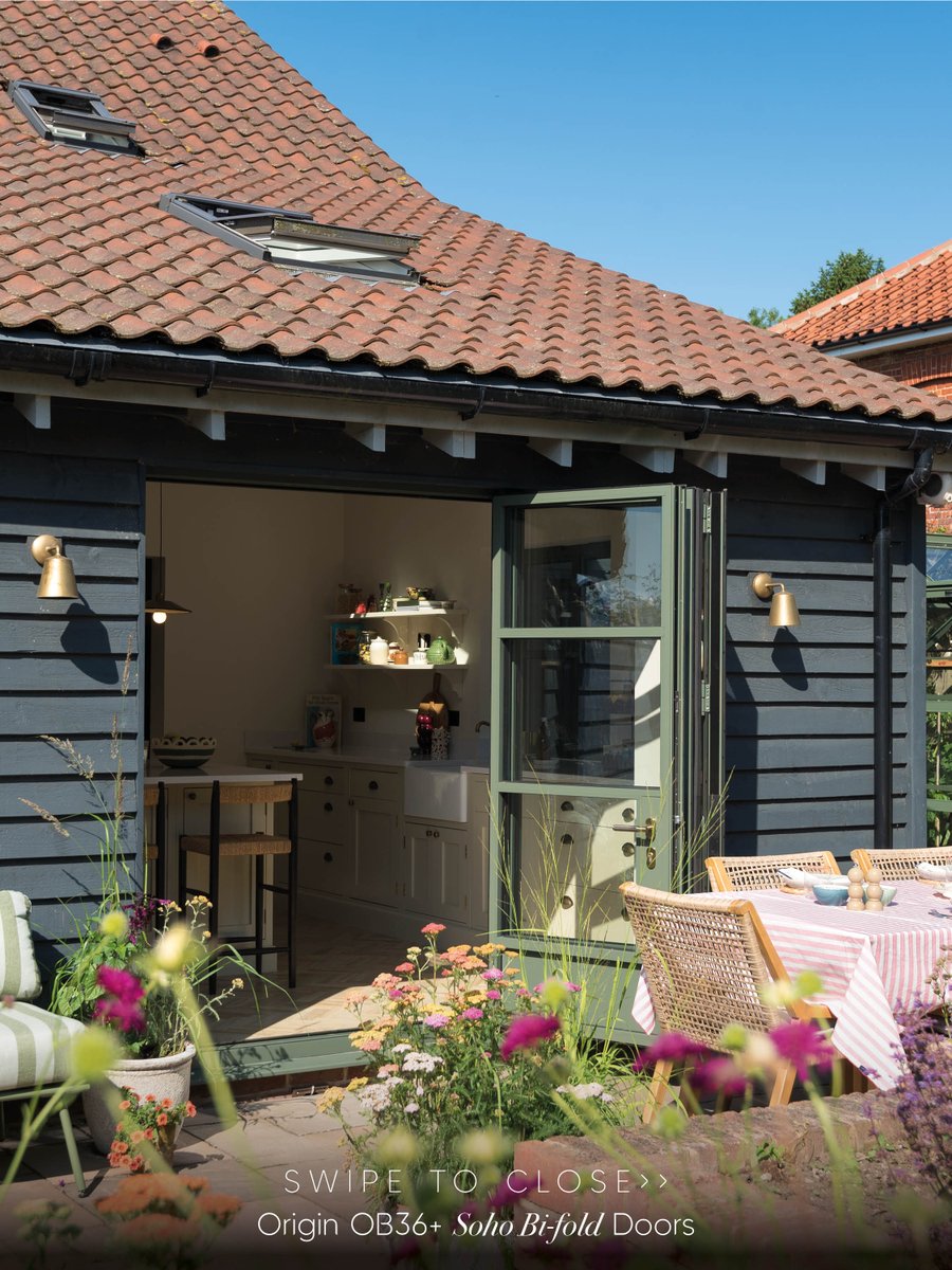 Originbifolds's tweet photo. Some homes simply belong in the countryside. 🌿

Designed by @bramleyandbear, this beautiful Norfolk home is full of thoughtful details. Finished in RAL 7009M Green Grey, these OB36+ Soho bifold doors feel bold enough to stand out, yet soft enough to sit effortlessly within the landscape.

The soho bars and solid lower panels frame the garden like a series of photographs, while our Signature knurled antique brass handles complete the look beautifully.

Swipe to watch the doors close so you see them in all their beauty... but let us know. Would you choose Green Grey for your own home?💚🩶

#OriginGlobal #BifoldDoors #LuxuryHomes #CountryHome #HomeInspiration