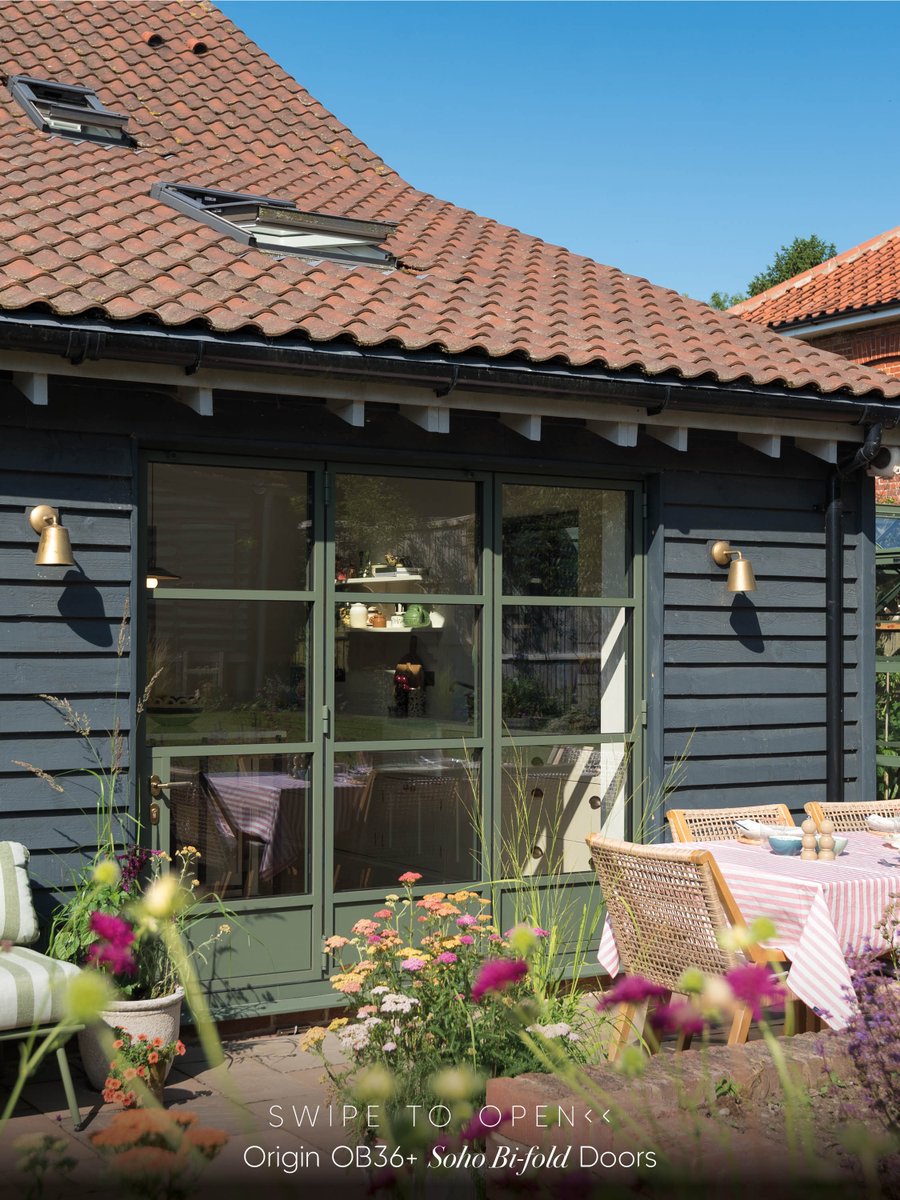 Originbifolds's tweet photo. Some homes simply belong in the countryside. 🌿

Designed by @bramleyandbear, this beautiful Norfolk home is full of thoughtful details. Finished in RAL 7009M Green Grey, these OB36+ Soho bifold doors feel bold enough to stand out, yet soft enough to sit effortlessly within the landscape.

The soho bars and solid lower panels frame the garden like a series of photographs, while our Signature knurled antique brass handles complete the look beautifully.

Swipe to watch the doors close so you see them in all their beauty... but let us know. Would you choose Green Grey for your own home?💚🩶

#OriginGlobal #BifoldDoors #LuxuryHomes #CountryHome #HomeInspiration