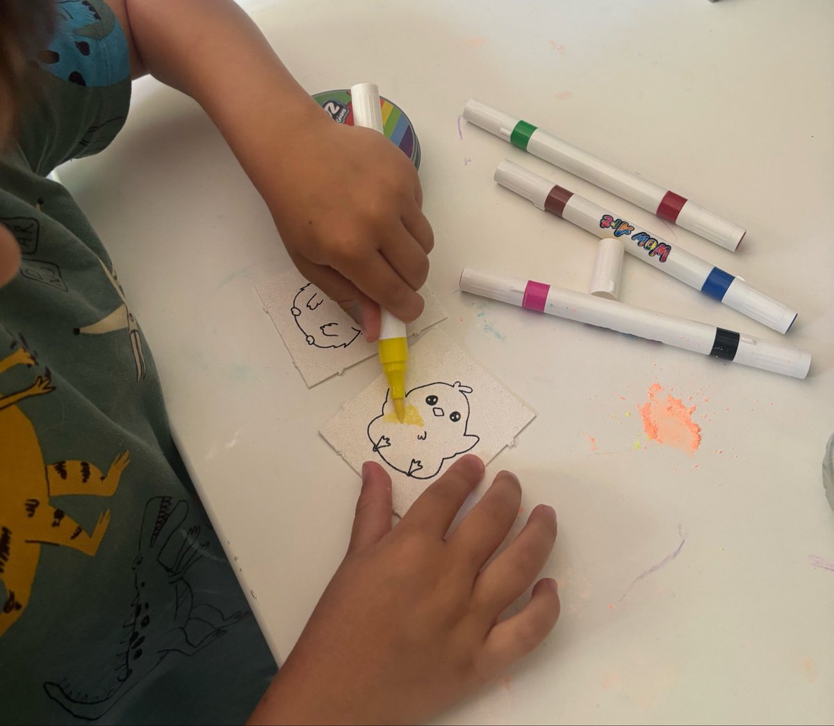 LohaMadison's tweet photo. My 5 y/o son has been begging to see @ATEEZofficial in concert. (He’s colouring ‘Mingi’s chick’ 🐣) Although there’s not an actual show I can take him to, I’ve got tickets to the light the way experience at @ShowcaseCinemas next month 😁 he will be so happy! #Atiny #Ateez https://t.co/vmYNOvmjtM