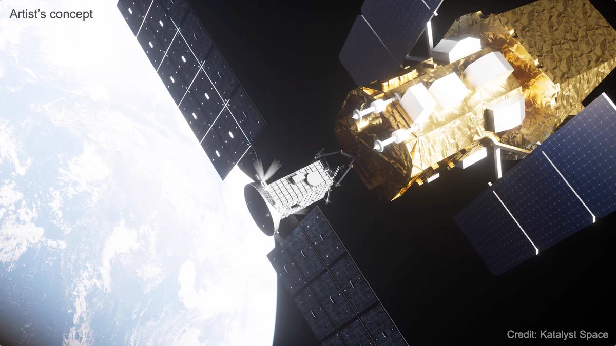 In this illustration, the LINK spacecraft from Katalyst Space attaches to NASA’s Neil Gehrels Swift Observatory in preparation to gradually lift Swift back to its original altitude. LINK, a silver rectangular spacecraft with large blue solar arrays on either side, uses three robotic arms to attach to Swift, a gold spacecraft with shorter black solar arrays. Three blue thrusters fire at the bottom of LINK. Swift has a more cylindrical body with a rectangular projection at the front. The left half of the background is taken up by a view of Earth, and the blackness of space fills the right. This image is watermarked with “Artist’s concept” and “Credit: Katalyst Space.”
