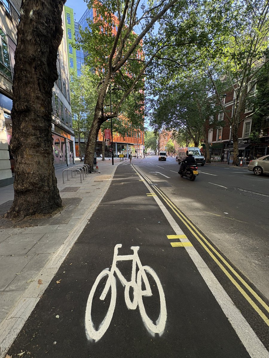 BobFromAccounts's tweet photo. New separated cycle lanes popping up on Shaftesbury Ave. All it takes is political will + the removal of some unnecessary parking spaces.

London is becoming a cycling city, reflecting a generational shift that recognises driving in urban areas as slow, inefficient use of time. https://t.co/afWpHH76I0