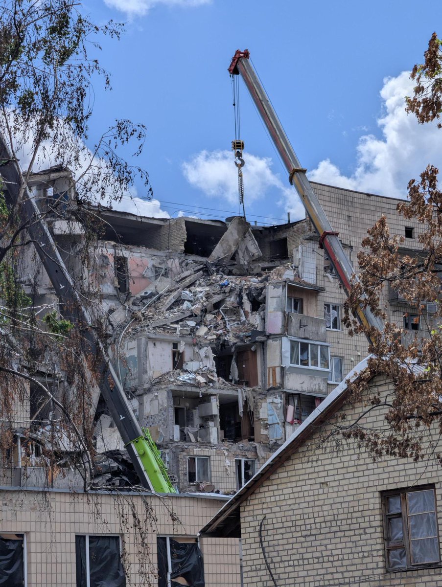UNHumanRightsUA's tweet photo. We are on the ground documenting serious human rights consequences of last night’s large-scale missile and drone attack by the Russian Federation on Kyiv City and Kyiv region, where according to Ukrainian authorities, at least 22 civilians were killed and 100 injured, including children.

At one of the locations in Kyiv, near a residential building, residents told us about their neighbours who were killed, including an entire family. At another residential building, people said that at least six residents had been killed, including a couple in their forties. Those who had taken shelter in the basement also had to be evacuated after the attack severely damaged the lower floors of the building. Search and rescue operations are still ongoing at this location.

The attack fits an alarming pattern of long-range missile and drone strikes with wide area effects against densely populated civilian areas, far from the frontline. 
 
“Last night’s attack by the Russian Federation reflects the continued use of long-range missiles and drones in populated areas, where they pose a significant risk to civilians,” said Danielle Bell, Head of our Mission. “The sustained use of these weapons, together with continued short-range drone attacks, is a key driver in the increase in civilian casualties documented by UN Human Rights this year.”