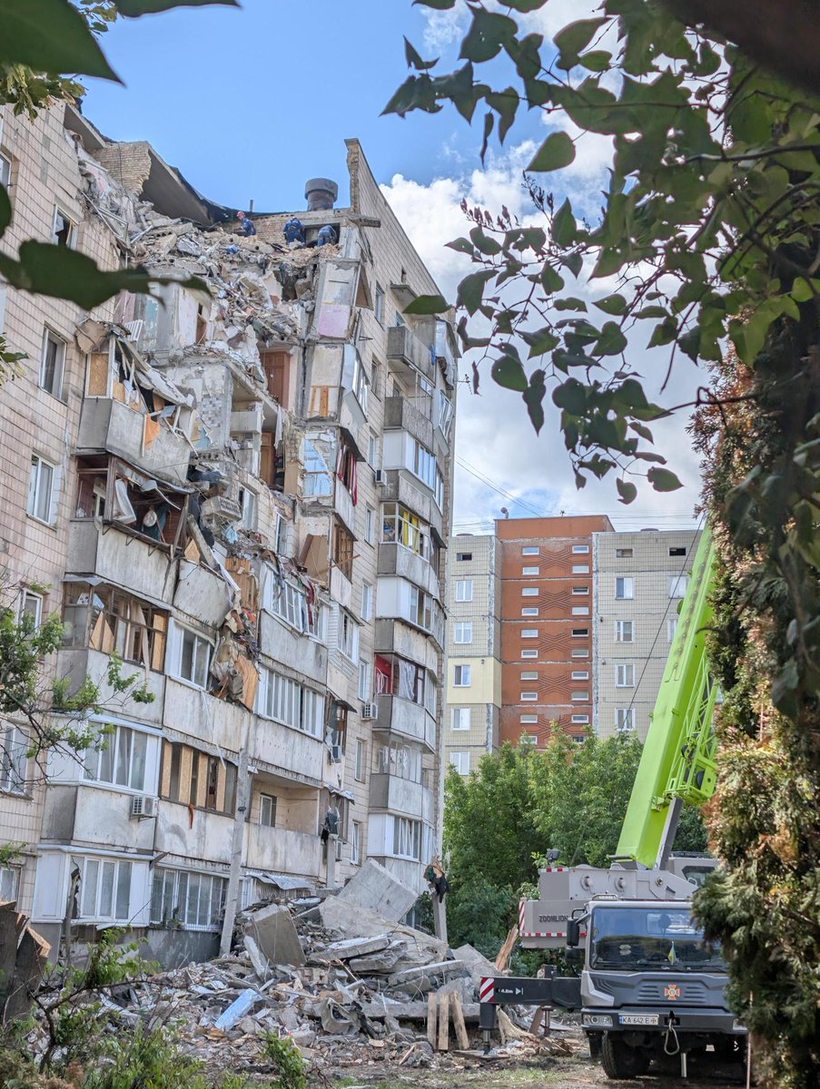 UNHumanRightsUA's tweet photo. We are on the ground documenting serious human rights consequences of last night’s large-scale missile and drone attack by the Russian Federation on Kyiv City and Kyiv region, where according to Ukrainian authorities, at least 22 civilians were killed and 100 injured, including children.

At one of the locations in Kyiv, near a residential building, residents told us about their neighbours who were killed, including an entire family. At another residential building, people said that at least six residents had been killed, including a couple in their forties. Those who had taken shelter in the basement also had to be evacuated after the attack severely damaged the lower floors of the building. Search and rescue operations are still ongoing at this location.

The attack fits an alarming pattern of long-range missile and drone strikes with wide area effects against densely populated civilian areas, far from the frontline. 
 
“Last night’s attack by the Russian Federation reflects the continued use of long-range missiles and drones in populated areas, where they pose a significant risk to civilians,” said Danielle Bell, Head of our Mission. “The sustained use of these weapons, together with continued short-range drone attacks, is a key driver in the increase in civilian casualties documented by UN Human Rights this year.”