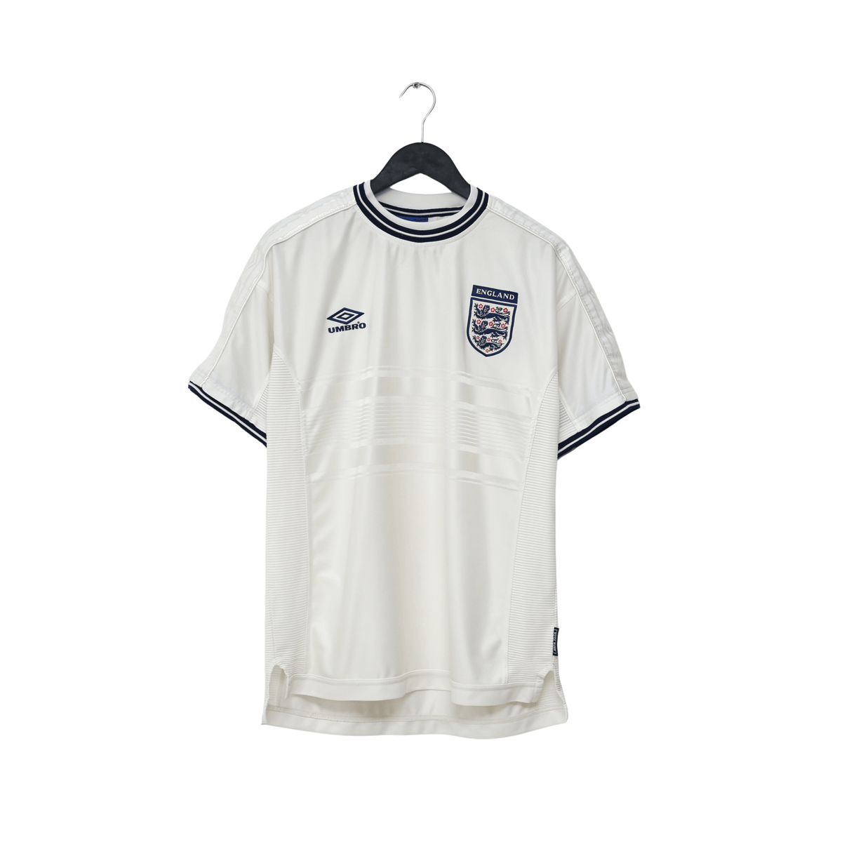 thefootballsc's tweet photo. Really think this is an underrated classic by @England x @umbro the round neck collar and shimmering diamond trim.  

🔗 https://t.co/pba8wMirmj

#england #footballshirt #worldcup https://t.co/wMVTzcsUZv