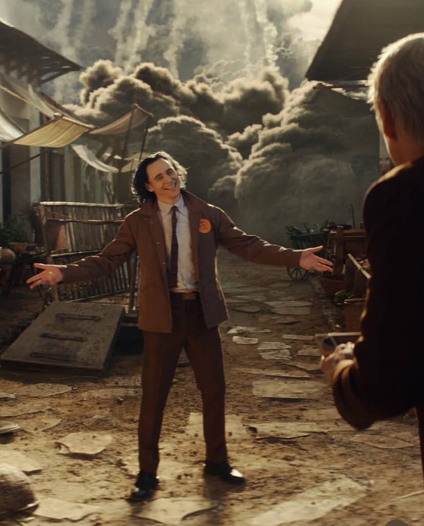 lokidelicate's tweet photo. this had me thinking abt how much i adore this picture btw, loki’s smile is as bright as ever as he dances in the pure chaos lmao. it’s so silly but comforting at the same time ennwne 💗 https://t.co/BOAmXFCBvt