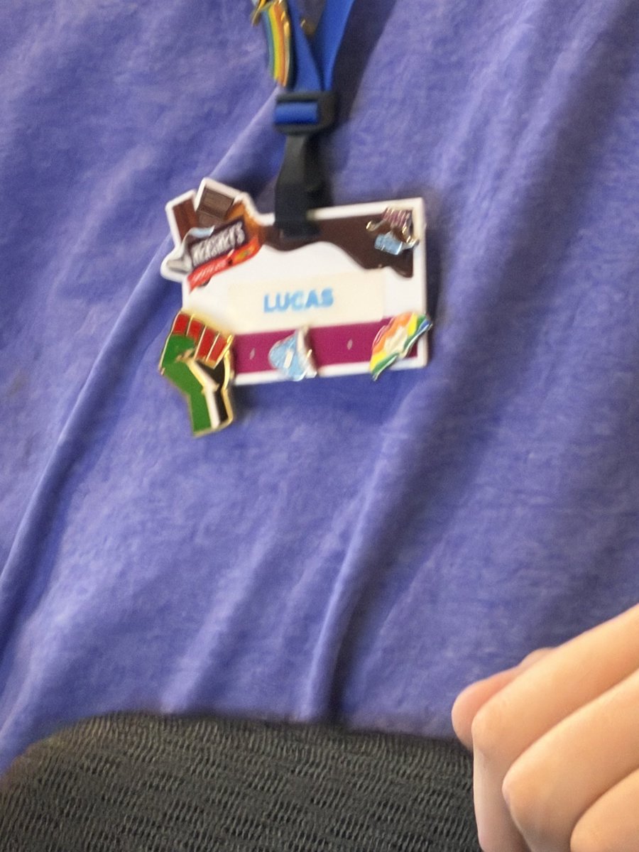 RedElephantbyks's tweet photo. While at Hershey’s chocolate world today, I came across an employee named Lucas who wore Palestinian flag while we were about to purchase tickets for a trolley ride. We immediately stopped our transaction, and told his manager. I hope Hershey takes it seriously and fires him. https://t.co/6jSAEet7sB