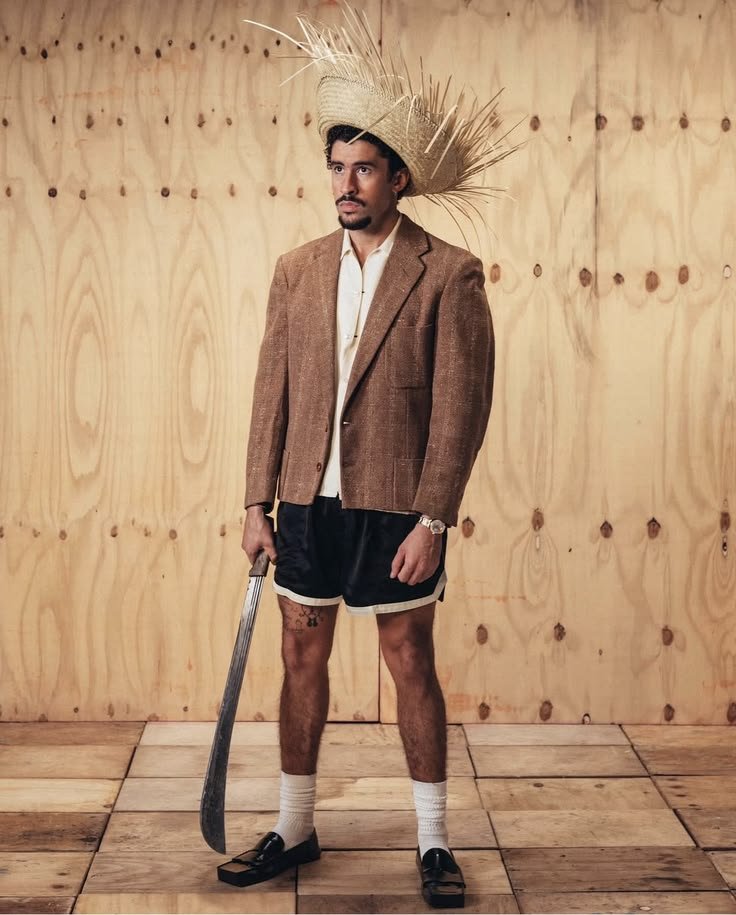AccessBadBnbm's tweet photo. Surprise! 👀 Thought Benito was done breaking the internet this week? Redefining style by bringing traditional country roots into a high fashion space. He really keeps us guessing! 🌾blazer combo is unmatched. 🔥 #BadBunny #Fashion https://t.co/gA7A3Xy3xj