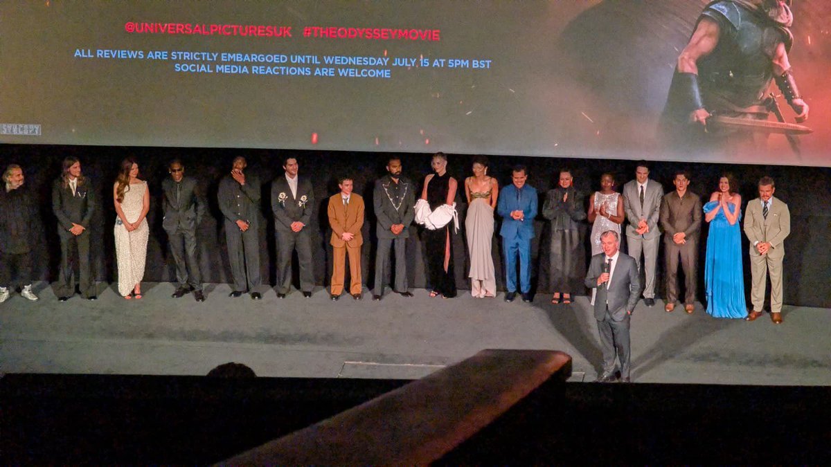 DiscussingFilm's tweet photo. The cast of ‘THE ODYSSEY’ on stage at the film's world premiere, led by Christopher Nolan. https://t.co/RpG56enUZX