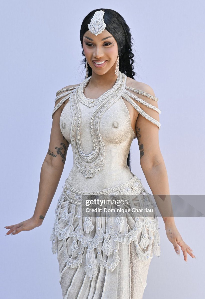theecardiroom's tweet photo. Rahul Mishra reveals that Cardi B’s outfit for his Haute Couture Week show in Paris was inspired by the Didarganj Yakshi, a historic Indian stone statue and a national treasure. ✨ https://t.co/ZeL1pnDVic