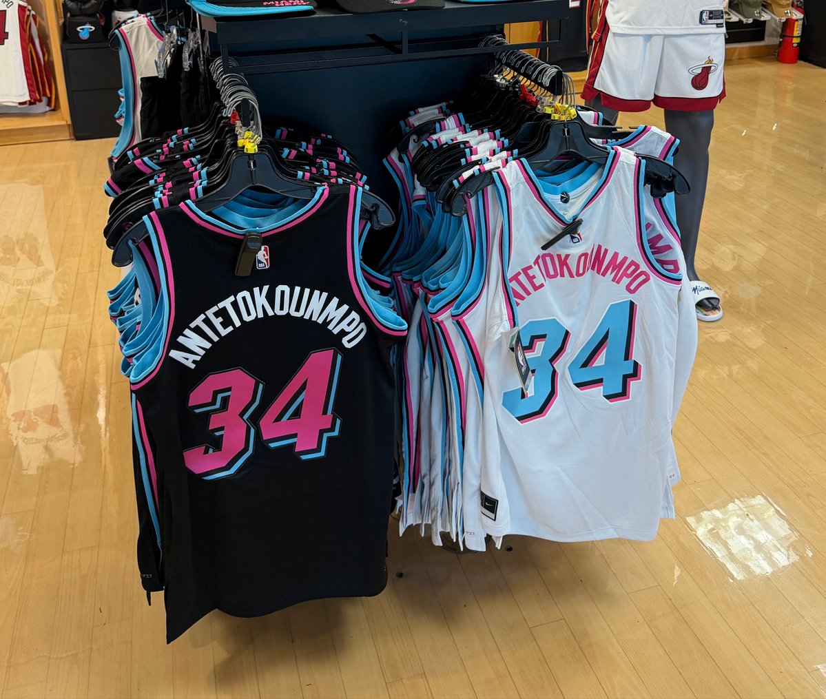 WillManso's tweet photo. The Giannis Antetokounmpo jerseys are at the official Heat stores, including at the Kaseya Center. https://t.co/ldi1NiwEUg