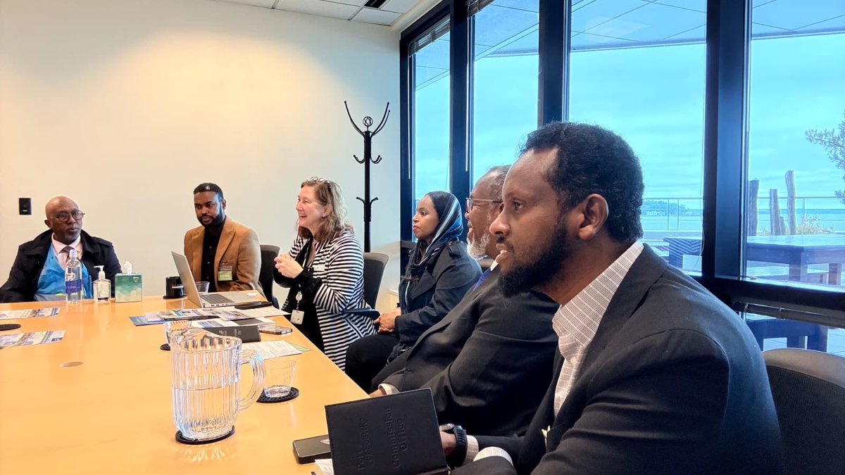 MPortAuthority's tweet photo. The Director General of Mogadishu Port, H.E. @AmbAmerico, received a formal invitation from Port of Seattle Commission member Ms. @HamdiSEA & was warmly welcomed by Ms. @HamdiSEA and Commissioner Mr. @SamChoTweets. 

During the meeting, the H.E. @AmbAmerico briefed the Seattle Port Commission on the significant progress and reforms implemented at Mogadishu Port, highlighting improvements in operations, the various services provided, the new Mogadishu Port Project, and ongoing development plans. For their part, the Seattle Port Commission presented an overview of the management, operations, and world-class services of Seattle Port.

The two discussed how to strengthen bilateral cooperation by establishing a Sisters Port Partnership, aimed at promoting the exchange of expertise, professional training, technical cooperation, and capacity-building programs for Mogadishu Port staff.

The Director General of Mogadishu Port, H.E. Ambassador Mohamed Ali Nur extended a formal invitation to Commissioner Ms. @HamdiSEA to visit Mogadishu Port on a working visit. Ms. @HamdiSEA gladly Accepted the invitation, marking the beginning of a strong partnership that will benefit both ports.
