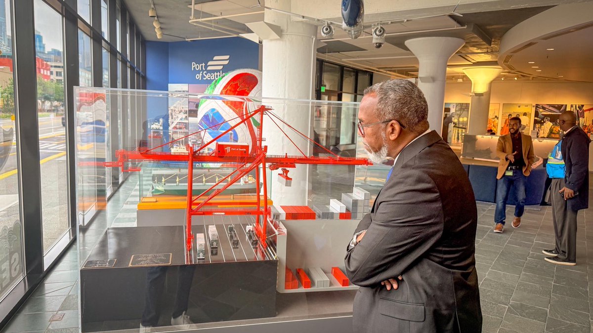 MPortAuthority's tweet photo. The Director General of Mogadishu Port, H.E. @AmbAmerico, received a formal invitation from Port of Seattle Commission member Ms. @HamdiSEA & was warmly welcomed by Ms. @HamdiSEA and Commissioner Mr. @SamChoTweets. 

During the meeting, the H.E. @AmbAmerico briefed the Seattle Port Commission on the significant progress and reforms implemented at Mogadishu Port, highlighting improvements in operations, the various services provided, the new Mogadishu Port Project, and ongoing development plans. For their part, the Seattle Port Commission presented an overview of the management, operations, and world-class services of Seattle Port.

The two discussed how to strengthen bilateral cooperation by establishing a Sisters Port Partnership, aimed at promoting the exchange of expertise, professional training, technical cooperation, and capacity-building programs for Mogadishu Port staff.

The Director General of Mogadishu Port, H.E. Ambassador Mohamed Ali Nur extended a formal invitation to Commissioner Ms. @HamdiSEA to visit Mogadishu Port on a working visit. Ms. @HamdiSEA gladly Accepted the invitation, marking the beginning of a strong partnership that will benefit both ports.