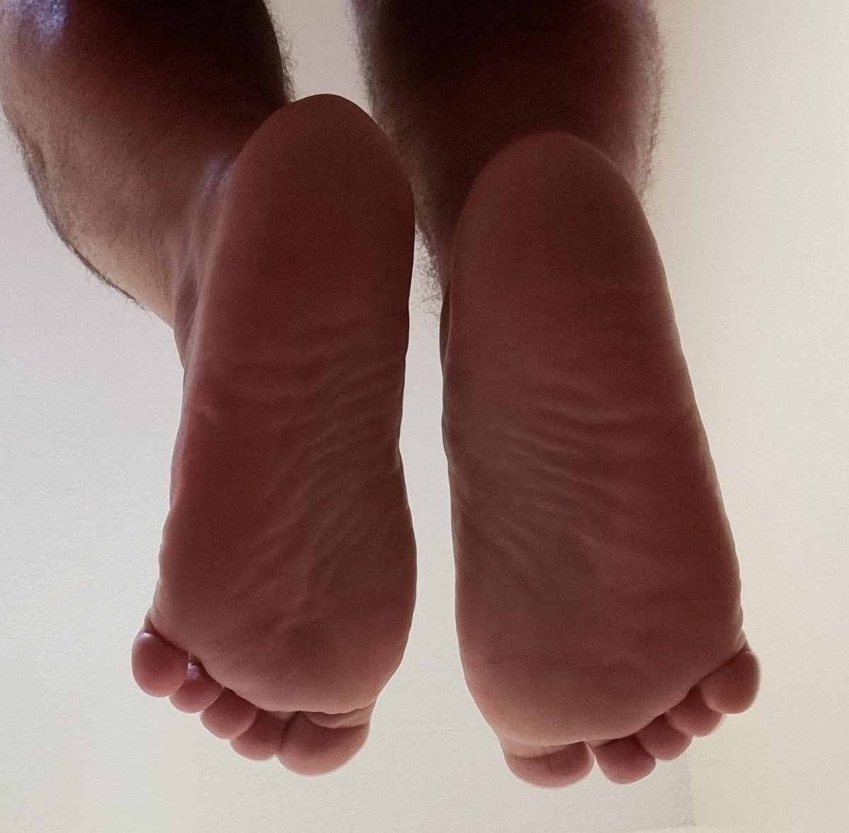 WMF_1985's tweet photo. This perspective is strictly reserved for the pathetic losers who know their only purpose in life is being My human footrest. Stare at these bare soles. Every like and repost is a formal application to have these heels pressed directly into your face. Hit the button, empty your wallet into My link, and drop to your knees in the replies to tell Me why you deserve to take My weight. Go.