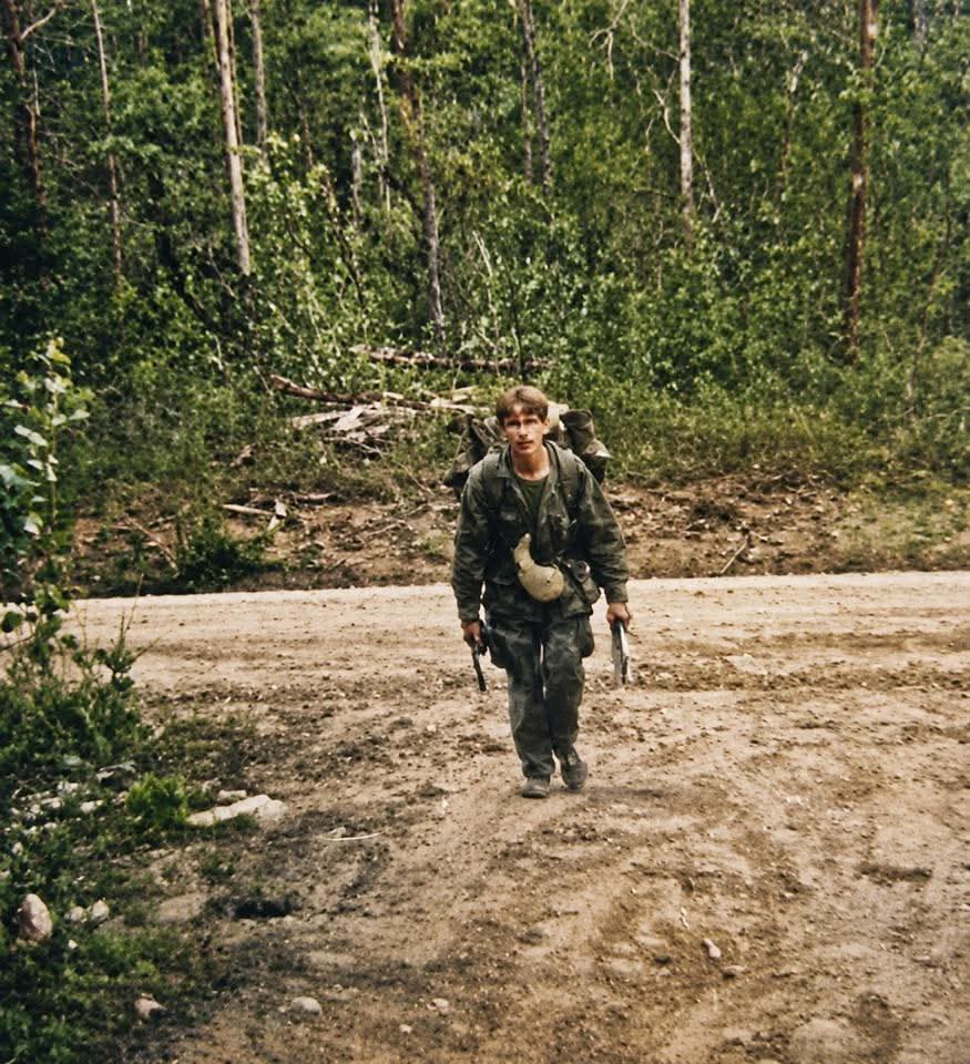 BlastingThrough's tweet photo. An Army veteran who served several years in the 82nd Airborne back in the 70s and early 80s had this photo colorized for me. It depicts my finishing the 40 miler.
I've been asked what the prerequisites for Delta are. They could be different today, but these were the prerequisites for Delta in 1978:
Male, volunteer, military occupational specialty (MOS)/branch immaterial, grade E-5 on second enlistment, E-6 or E-7, no limiting physical profile, minimum 22 years old, U.S. citizen, GT score 110 or higher (may be retested), pass Delta Force physical, pass five-event Physical Combat Proficiency Test (PCPT) (sit-ups, the horizontal ladder, run-dodge-jump, inverted crawl, and two-mile run - the youngest age standard was the benchmark) and 100 meter swim in Battle Dress Uniforms (BDUs) and boots (no time standard), qualified in current primary Military Occupational Specialty (MOS), pass formal selection course, and airborne qualified or willing to volunteer for airborne training/duty.
  The incentives were advertised as:  Most realistic and rigorous training in the U.S. Army, work with dedicated, professional soldiers, opportunity to earn and assume real responsibility, tour stability (6 years if job proficiency is maintained - for NCOs), opportunity for world-wide travel, satisfaction of belonging to a unique team, advanced military schooling opportunities, additional incentive pay and allowances, and a true sense of immediacy and importance in serving your country.
  The Physical Fitness Test has changed as the standards changed, and the military post no longer has horizontal bars and a run-dodge-crawl course. The swim test was done in a pool or open water. If you passed, but it was noted that you were a weak swimmer, you would be given swim lessons in the Operator Training Course.