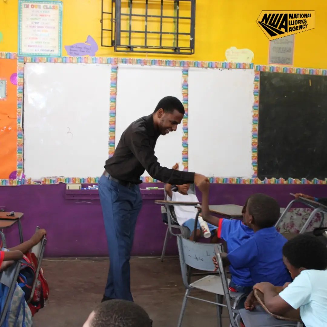 NWA_JA's tweet photo. SCHOOL IS OUT, but not before we celebrated Boys’ and Girls’ Day 2026 with the students at the Waterford Primary School!🎒✨

We spoke with these future leaders, shared words of encouragement &amp; issued stationery items. See the smiles &amp; highlights from our visit!👇🏾📸

#NWAJamaica https://t.co/64VSaYvCwG