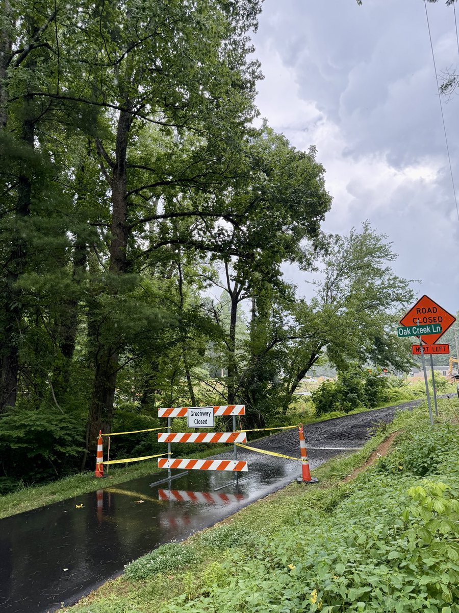 HendCoLocalGovt's tweet photo. Heads up, Ecusta Trail users! 🚲🌿
The closure at White Pine Drive went into effect Monday, July 6th as @NCDOT and the Town of Laurel Park move forward with the U.S. 64 modernization project. 
More info: https://t.co/zfYduoUOrg https://t.co/XmXGer2ECd