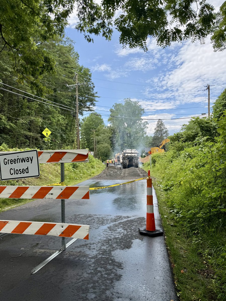 HendCoLocalGovt's tweet photo. Heads up, Ecusta Trail users! 🚲🌿
The closure at White Pine Drive went into effect Monday, July 6th as @NCDOT and the Town of Laurel Park move forward with the U.S. 64 modernization project. 
More info: https://t.co/zfYduoUOrg https://t.co/XmXGer2ECd