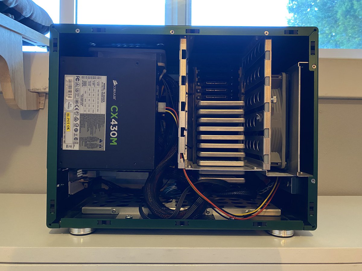 Strangelikeus's tweet photo. Channeling my inner @RaidOwlTweets and @JayzTwoCents by irreversibly modifying an irreplaceable PC to make something no-one else has/wants. Liberated a 16x drive module from my 2nd-hand 45Drives Stornado(Mk1) &amp; hacked bits off a custom anodized ITX case to make an all-flash NAS. https://t.co/yqkCHIlP0l