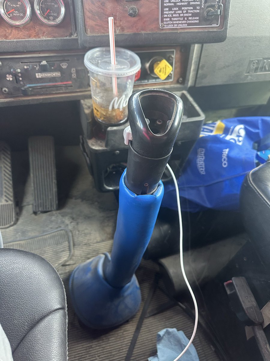 HeliFueler's tweet photo. My shifter was a little chilly this morning. I tucked it in and it feels better now. 
Do they make these shifter sleeping bags for the auto-shifts? https://t.co/aDROzTWyrp
