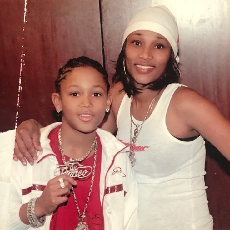 OfficiaBob's tweet photo. A rare look at a young Lil Romeo and his mother Sonya Miller, holding up his signature No Limit chain. https://t.co/EKsWX0GKjn