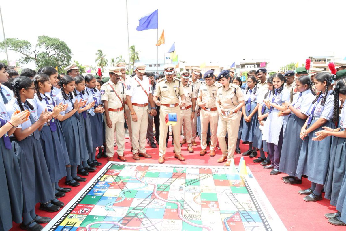 CVAnandIPS's tweet photo. Today, I inaugurated the Command control centre video wall and the newly installed 225 CCTV cameras around #Khammam district and connected here. Felicitated the sarpanchs and elders who contributed funds for installing them. Also inaugurated the Road Safety Awareness Centre at Khammam #Police Commissionerate. 

The Centre is designed to level up public awareness, especially among children, on road rules, safe practices and avoiding common mistakes through infrastructure that closely mirrors real-world road conditions. I also distributed helmets to traffic personnel and citizens, reminding them that not wearing one remains a leading cause of fatalities in road accidents. Rolling the dice on the road safety Snakes and Ladders game with schoolchildren was fun. Such interactive sessions reaches Gen Z and Gen Alpha far better, as they may not heed conventional bureaucratic messaging.
