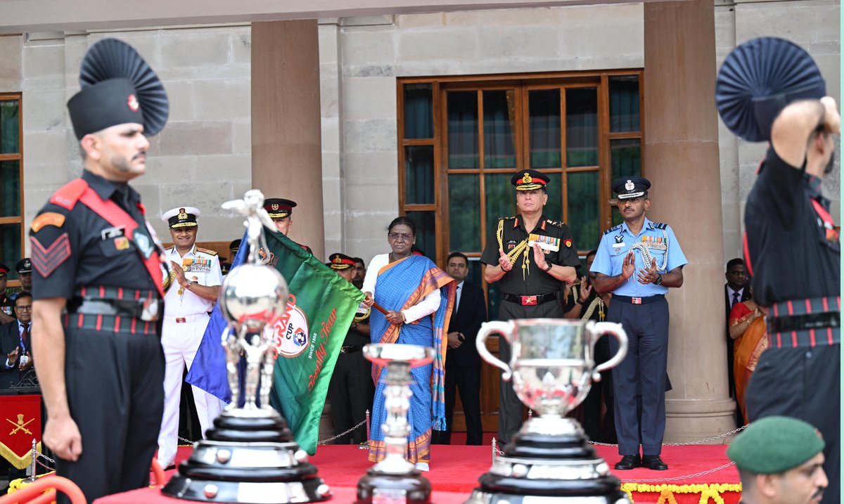 rashtrapatibhvn's tweet photo. President Droupadi Murmu unveiled and flagged off the Trophies of the Durand Cup Tournament 2026 at a function held at Rashtrapati Bhavan Cultural Centre. She said that the significance of sporting spirit is not limited to sports alone and it teaches us the values of equality, cooperation, and remaining steadfast even in adverse circumstances. She underlined that we, the citizens of the country,  can achieve the goal of Viksit Bharat by standing united, just as football players support one another in their team's march to victory.