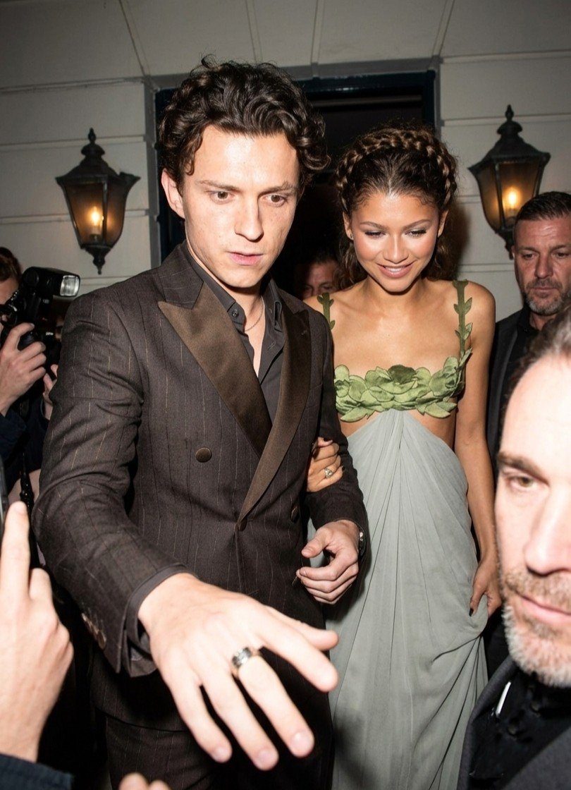 BoinkBuzz's tweet photo. Zendaya &amp; Tom Holland photographed leaving ‘THE ODYSSEY’ Premiere 📷 https://t.co/25CaWg8eEn