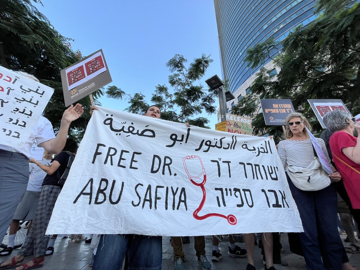 PHRIsrael's tweet photo. Yesterday, we took part in a demonstration calling for the release of the 14 doctors from Gaza who are being held by Israel without charge and under inhumane conditions.

At the demonstration, PHRI volunteers and staff members called for the immediate transfer of Dr. Hussam Abu Safiya from the Rakefet detention facility and for an urgent visit by an independent body to assess his condition firsthand—before it is too late.

We cannot allow this issue to fade from public attention. We all have a responsibility to keep speaking out, sharing the information, and reaching those with the power to change the situation.

Photo credit: Fang Gleizes for PHRI