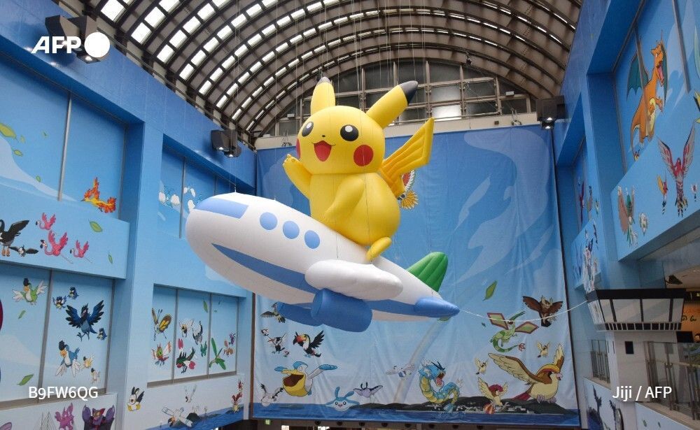 AFP's tweet photo. 🇯🇵 An airport in a remote Japanese region hit by a deadly earthquake in 2024 was given a new look on Tuesday, temporarily nicknamed after the Pokemon universe, and its lobby adorned with a floating Pikachu on a plane-shaped balloon. 
➡️ https://t.co/U0behbI6Fo https://t.co/cCaKrCEmqE