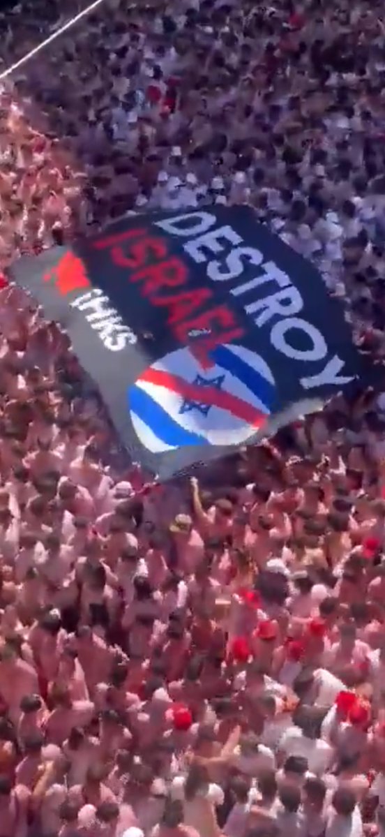 RealAlexJones's tweet photo. Hundreds of thousands of Muslim invaders took over the San Fermin Festival in Pamplona, Spain yesterday. 

They unfilled giant banners that said “DESTROY ISRAEL.”

Just because I am critical of Israel does not mean I want to destroy them.

This is not going to end well for anyone…