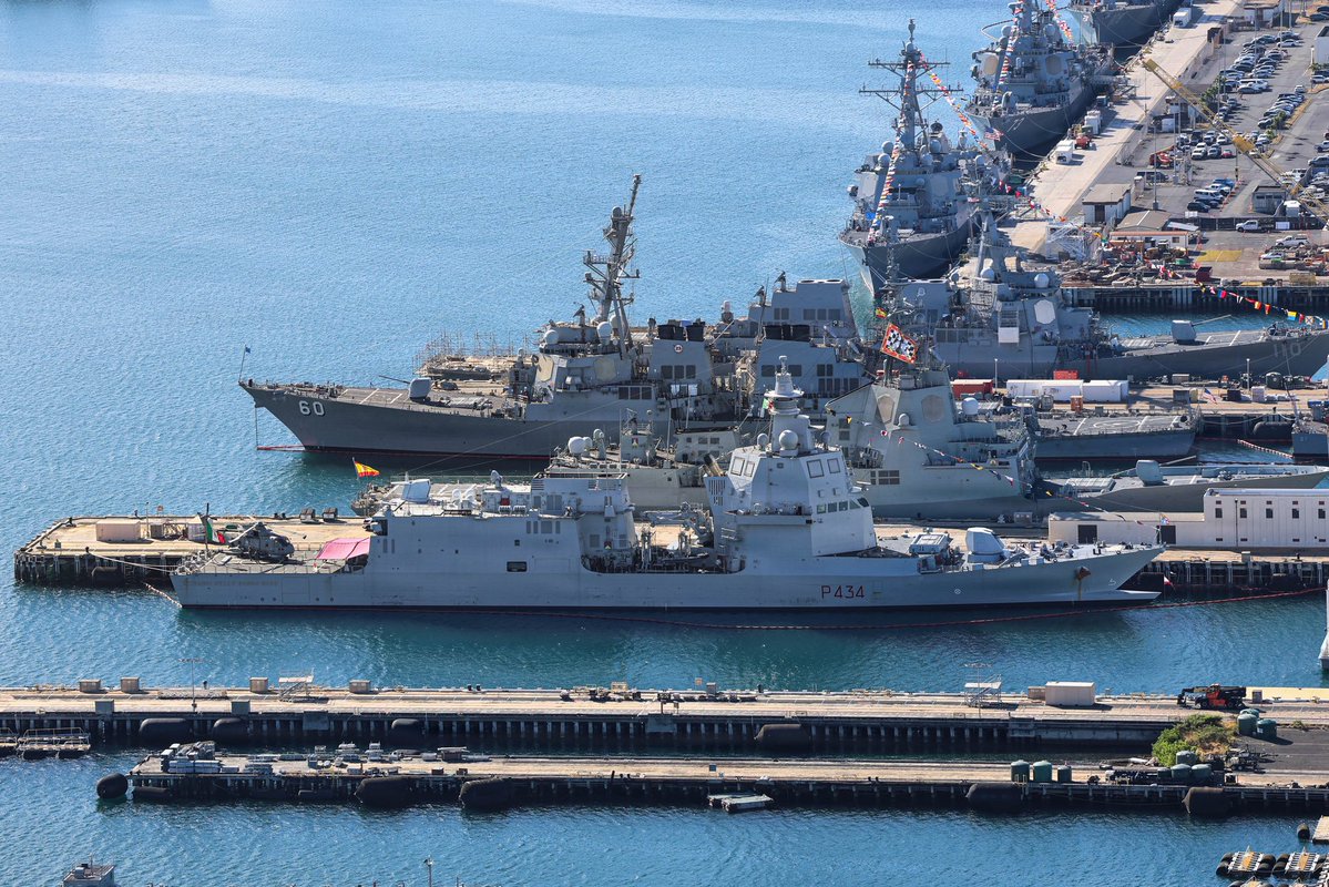WarshipCam's tweet photo. U.S. Navy and partner nation ships dock at Ford Island and Joint Base Pearl Harbor-Hickam, Hawaii during RIMPAC 2026 - July 3, 2026   SRC: https://t.co/KIWJUJPkYd https://t.co/W2vtxegTvR
