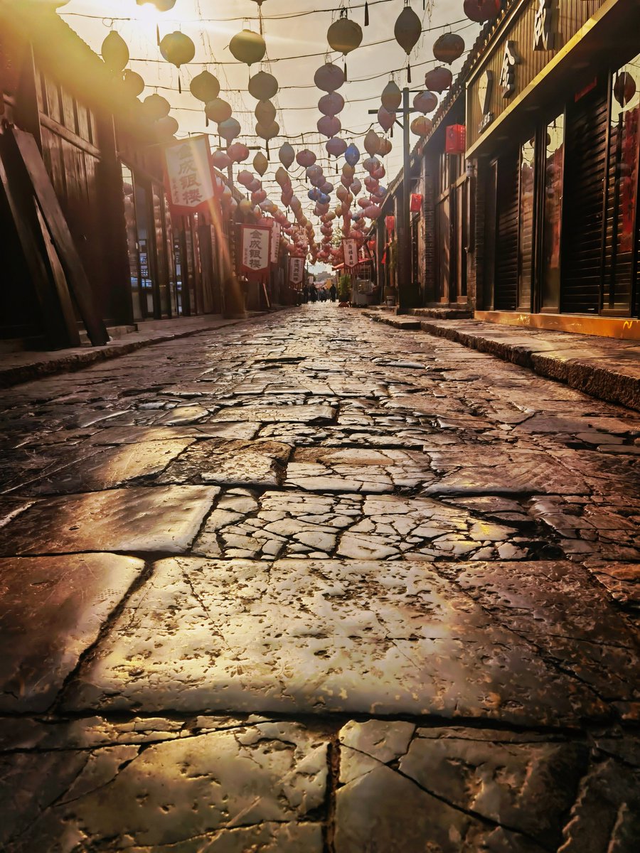 BFehrholz's tweet photo. Got stuck in the city’s golden hour glow—this random alley snap hit different. Street vibes u003e fancy shots, fr. https://t.co/DqzNivfCMh