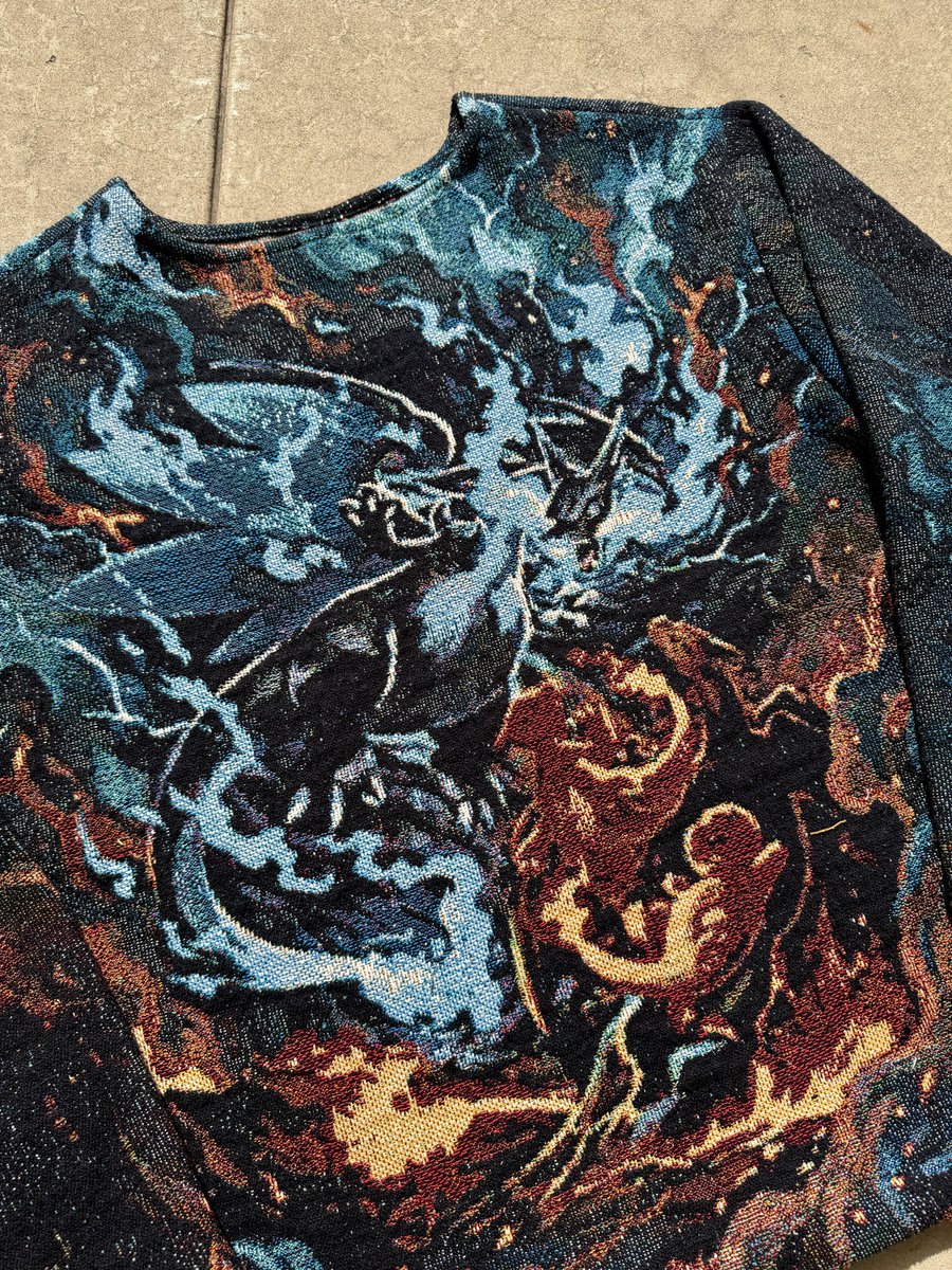 MadeByWoven's tweet photo. Turning Pokémon cards into wearable pieces every day until I officially collab with Pokémon.

Day 3: Mega Charizard X ex https://t.co/T9EO37hiyu