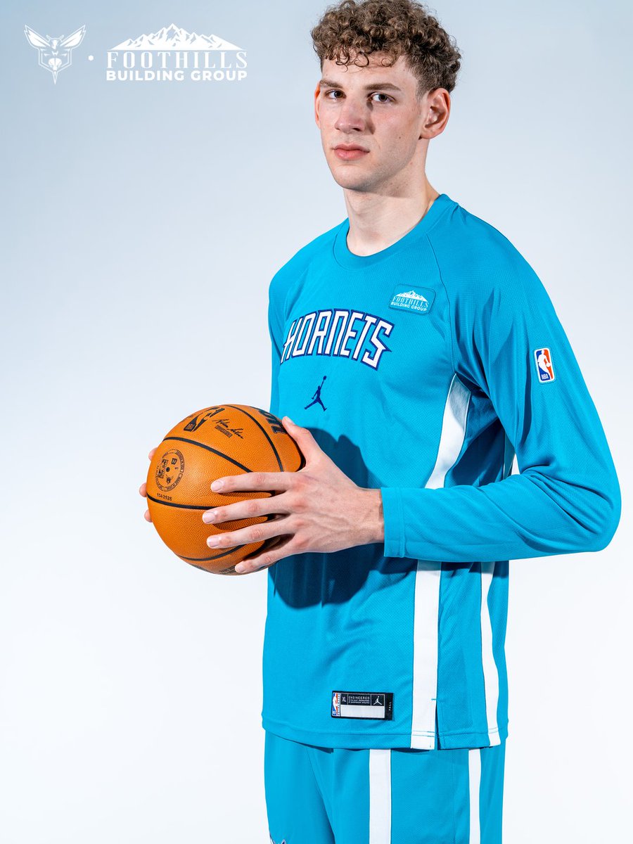 hornets's tweet photo. first look 👀

we’re excited to welcome foothills building group as our first-ever shooting shirt and warm-up jacket patch partner and the presenting partner of our 2026 NBA Summer League team! https://t.co/FpP8di5twh
