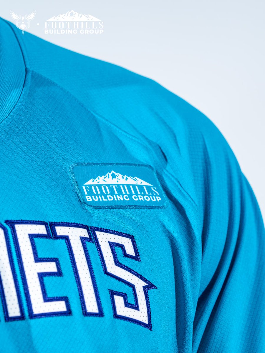 hornets's tweet photo. first look 👀

we’re excited to welcome foothills building group as our first-ever shooting shirt and warm-up jacket patch partner and the presenting partner of our 2026 NBA Summer League team! https://t.co/FpP8di5twh
