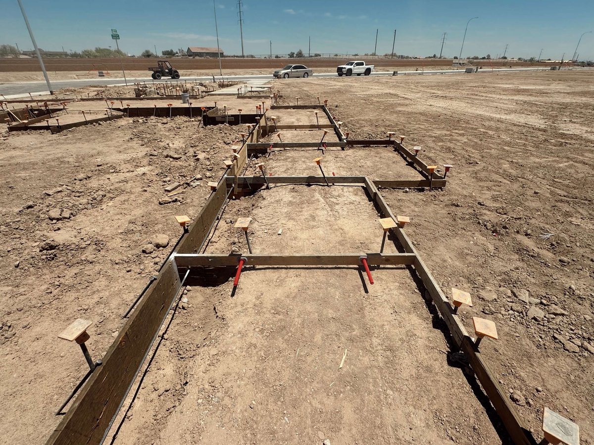 MonroyConstruct's tweet photo. The pour gets the attention, but preparation makes it possible. Our team was out in Alamar setting forms and getting everything ready for the pour this week. It's the work behind the scenes that keeps projects moving forward. #MonroyConstruction #FormSetting #PhoenixAZ https://t.co/EY18Ihaa7r