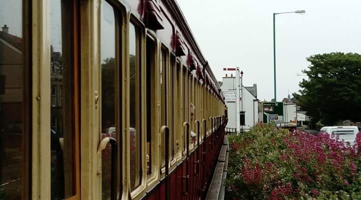 castletown_imr's tweet photo. Held at the signal with a northbound service near Mill Road crossing; trains are running daily to the standard 'R' timetable and our gift shop is open #iomrailway #heritage #steam #nostalgia #greatphoto #Castletown #IsleofMan #trains #IMR #signal #carriages #BalleyCashtal #Manx https://t.co/8b15hQ07OD