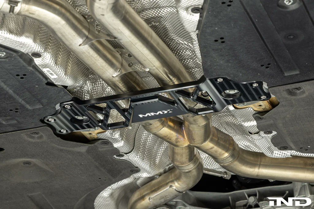 IndStyle's tweet photo. The all-new MMX Performance Underbody Chassis Braces are now available for the BMW F8X M2/M3/M4, G87 M2, and G8X M3/M4.

Precision CNC-machined from billet 6061-T6 aluminum, each brace provides an additional 15mm of exhaust clearance while maintaining factory ground clearance and increasing chassis rigidity. A direct bolt-on upgrade with no cutting or drilling required.

https://t.co/lFX3kdeDcx

#BMWM #BMWM2 #BMWM3 #BMWM4 #MMXPerformance #INDDistribution