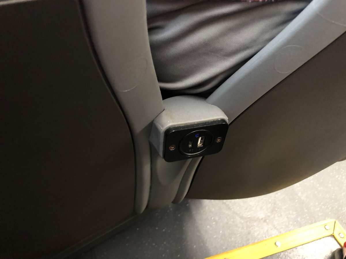 EMichaelBall's tweet photo. @RideOnMCT Check inventory of USB chargers across your fleet. Yesterday, I spotted multiple, likely non-functional chargers on both 4164E and 4167E. I didn’t have a USB cable to confirm. Some chargers appeared working on at least the former bus. https://t.co/XG7rP6kPsO