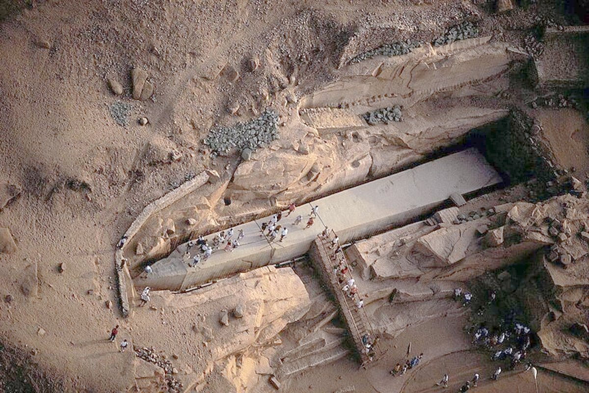 egyptomuseum's tweet photo. The Unfinished Obelisk in Aswan

▫️This obelisk is carved directly out of bedrock in a granite quarry, and was intended to stand at an estimated 42 metres (137 feet). It is believed to weigh around 1,200 tonnes.

The obelisk was abandoned due to cracks forming in the stone, offering modern visitors a unique opportunity to see the techniques the #AncientEgyptians used to create these colossal monuments. It dates from the reign of the female pharaoh #Hatshepsut, c. 1500 B.C.