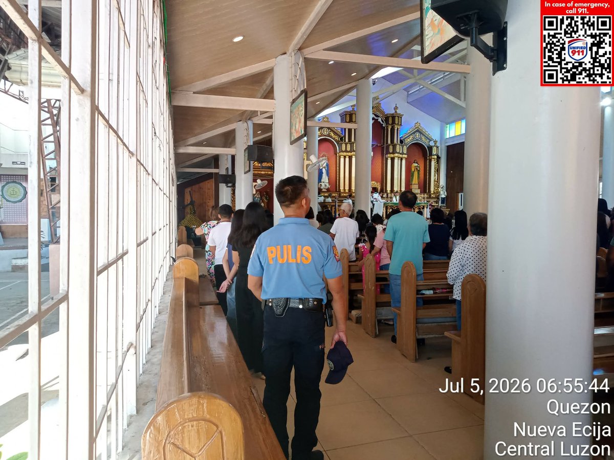 QuezonPnp_Ne's tweet photo. On July 5, 2026, at about 6:55 AM, personnel of Quezon MPS led by PMSg Rodolfo R Cabanatan Jr, duty patroller, under the supervision of PMAJ ROBERT B DE GUZMAN, COP, conducted a police visibility Holy Mass at Holy Family Academy, Barangay II, Quezon, Nueva Ecija. https://t.co/i06ydIgfCq