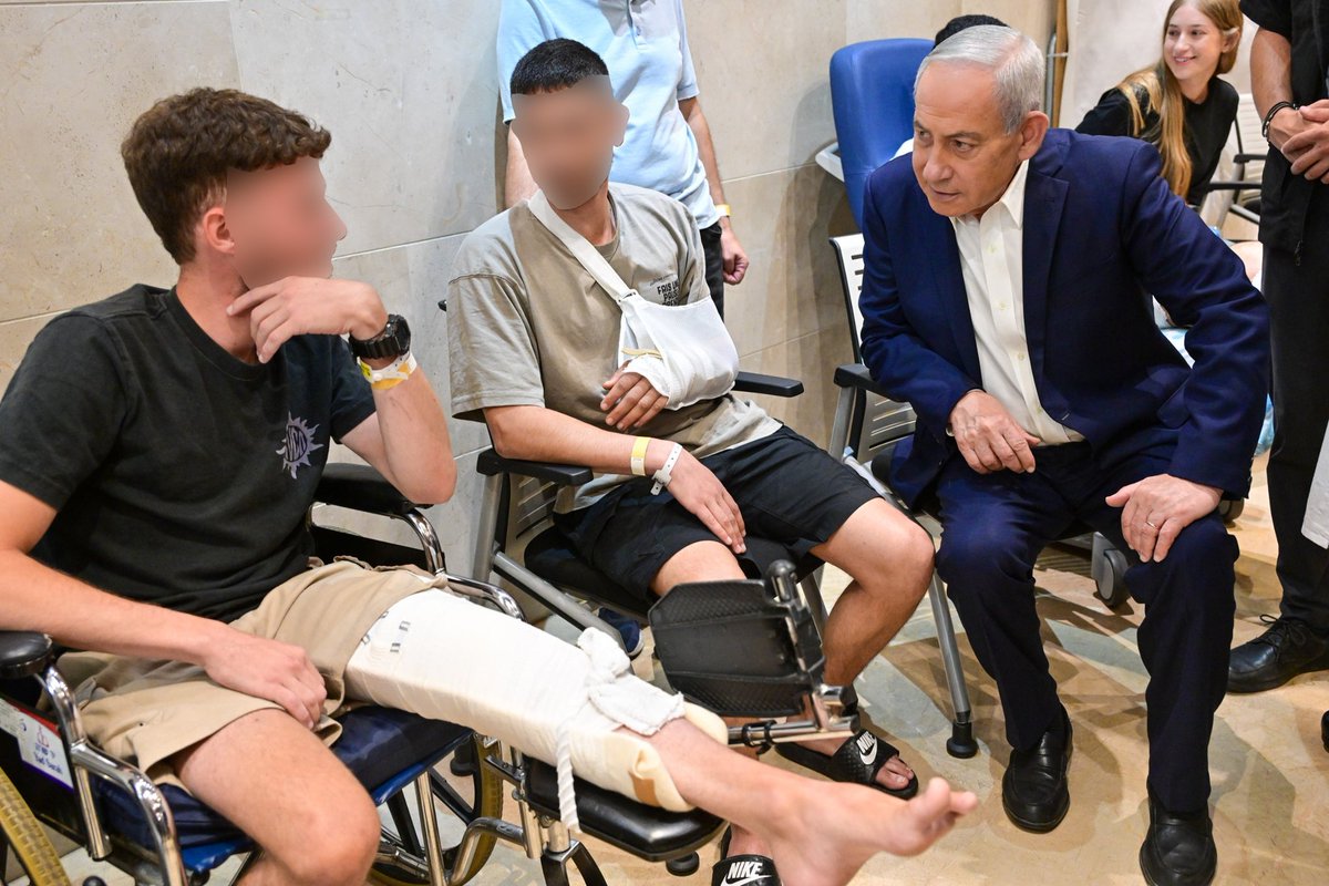 IsraeliPM's tweet photo. Prime Minister Benjamin Netanyahu visited wounded IDF regular and reserve soldiers at Rambam Health Care Campus in Haifa.

Prime Minister Netanyahu:
"We are not giving up, and you are right about one thing, Yonatan. There is far more unity within the nation than what is reflected later in the Knesset. Much more unity, much broader, much deeper and I believe this is a strong foundation for the future, and you represent that.

I admire you, and I am always inspired by your spirit. I am not just saying this superficially. I am truly inspired. I know you are going on a difficult journey. It is not easy, but your spirit is tremendous.

I don't think there is anywhere else in the world that provides better care. On the contrary, I say there is nowhere else in the world that delivers with this level of skill, speed, spirit and success. Therefore, I wish you both good health and a full recovery."

The Prime Minister was accompanied by Rambam Director General Dr. Michal Mekel.