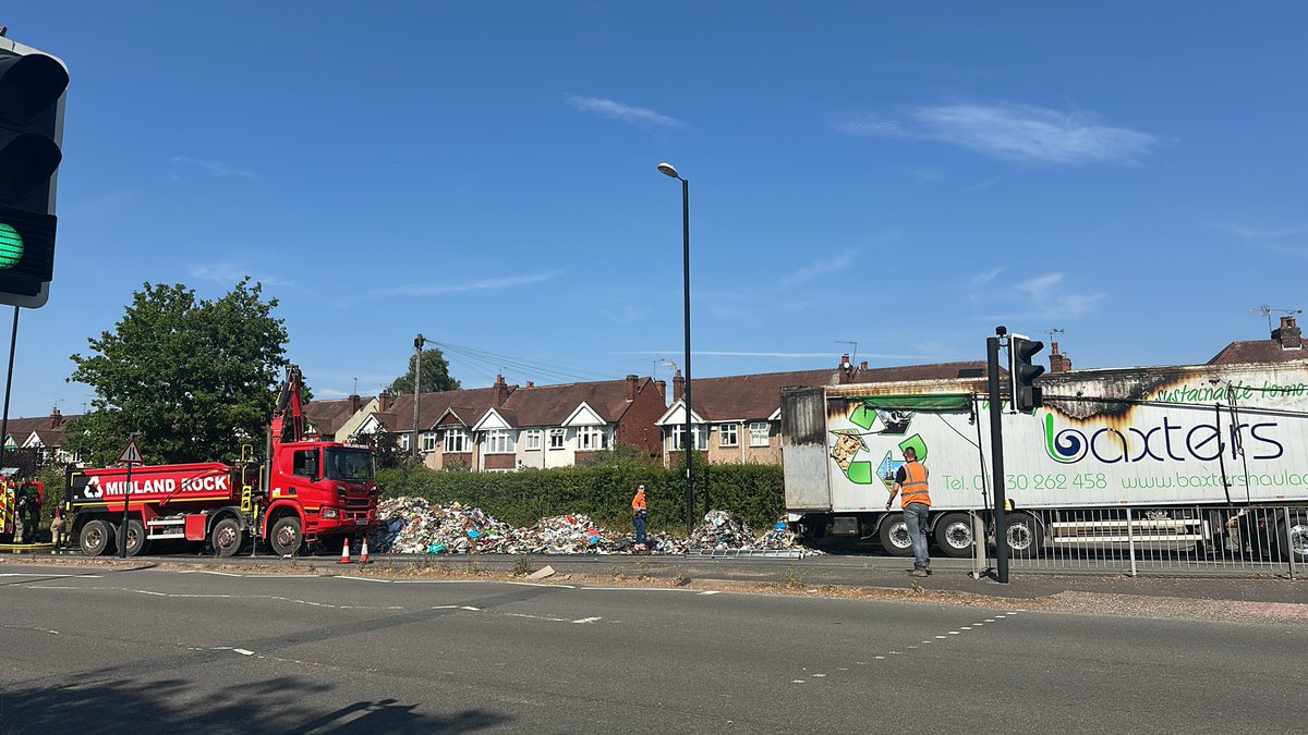 Samlynn05's tweet photo. A lorry caught fire on the A45. There are two fire engines on scene and a JCB excavator has recently arrived. One passerby shared that the highway is blocked further down, and traffic maps show heavy traffic. @live_coventry https://t.co/PmSOFnMeQB