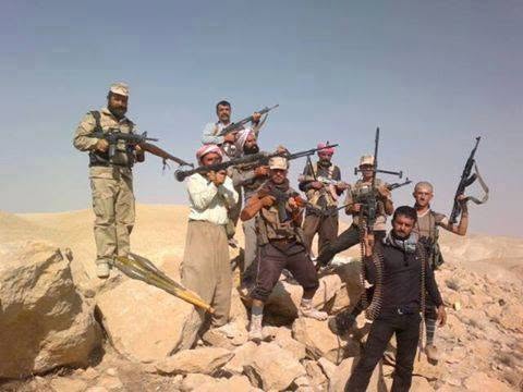 RojavaNetwork's tweet photo. Yazidi fighters in Şingal resisting ISIS attacks, 2014 (archive) https://t.co/VrsiTE5F4Z