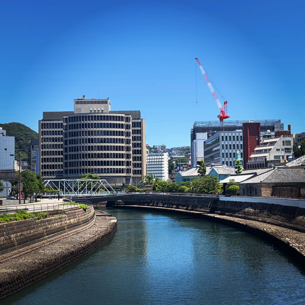 BaseDejima's tweet photo. 【今日の一枚】
青空の下に
消えた出島表門橋
橋は何処へ

インスタで開催中の『出島な写真展』、是非ご覧ください。
https://t.co/Z2c9vfhv2H

#出島　#出島表門橋　#写真展 https://t.co/4RqKBPLoZQ