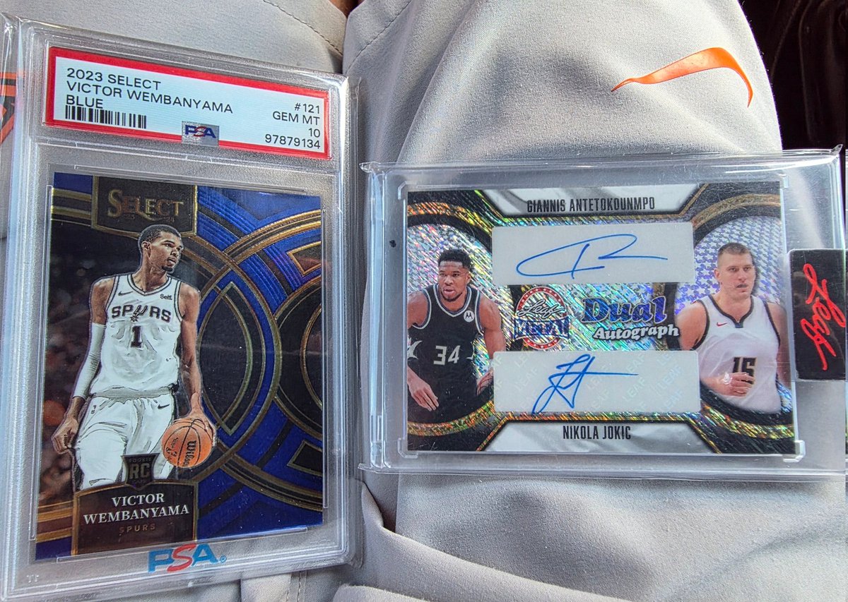 jbbernstein's tweet photo. And of course I could not get home without swinging through the trading card shop and picking these two beauties up @PaniniAmerica #select @PSAcard 10 for @wemby and a @Leaf_Cards @Giannis_An34 and #TheJoker https://t.co/GJzSSHDeCk