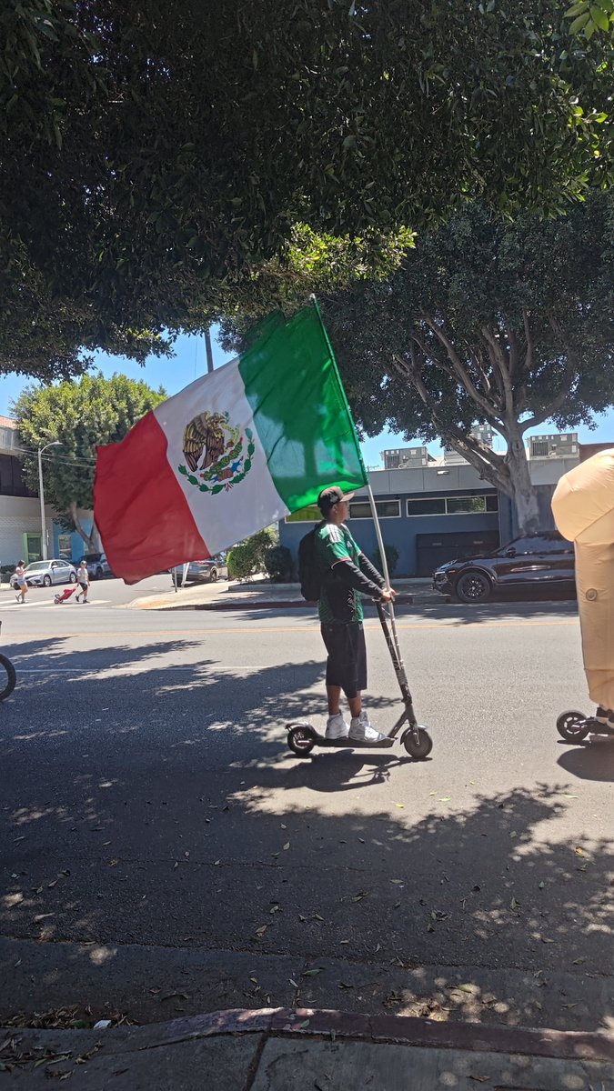 DangerMonadLOL's tweet photo. They rolled by in an inflatable penis costume and big Mexican flag lol https://t.co/q2uo7koOhk