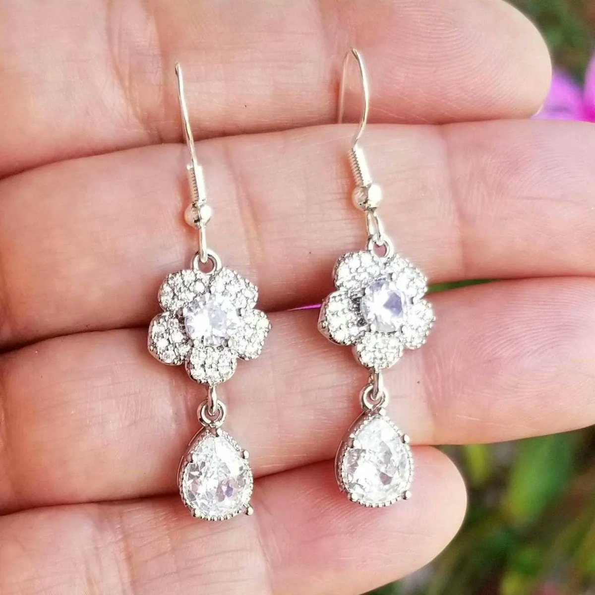 TrendingNowGift's tweet photo. Sterling Silver White Sapphire Dangle Earrings #jewelry #earrings #dangleearrings #floralearrings #whitesapphire #bridaljewelry #fashion #FashionGirl #FashionInspo #HandmadeEarrings #HandmadeJewelry #giftforher #giftsforher #gift #etsygifts

 https://t.co/TrEP7jSltQ via @Etsy https://t.co/gX2QmQfxeY