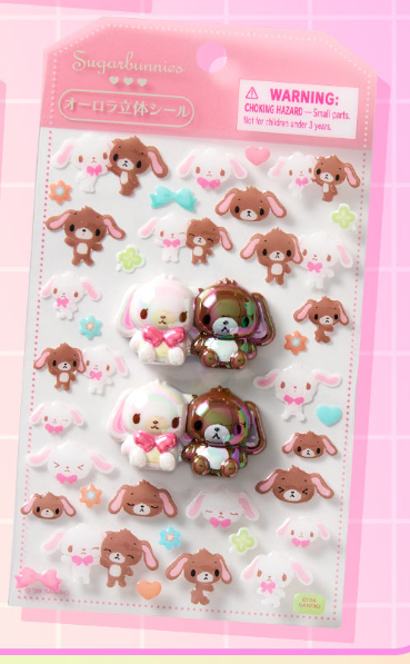 shugabani_info's tweet photo. 【新商品情報】

「キャラめきシールふれんず」が登場🎀

#シュガーバニーズ もラインナップ🐰🤍🤎
オーロラや金箔、ビーズ入りのぷっくりシール＆シールバインダーが可愛い✨

📅7/15(水)発売
📍サンリオ直営店
🛒オンラインショップ：https://t.co/queJ1rDcjT　#pr

#サンリオ #しろうさ #くろうさ https://t.co/8VRHGEZqug